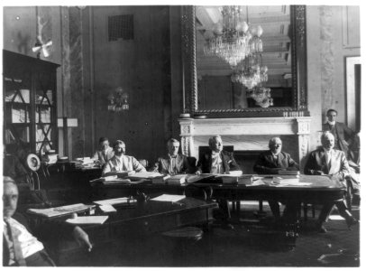 U.S. Senate Sub-Committee on Labor Investigation, seated at tables covered with papers and fans LCCN91786723