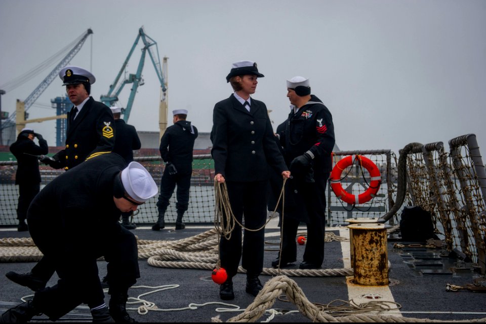 U.S. Sailors aboard the guided missile destroyer USS Truxtun (DDG 103) prepare to pull into Constanța, Romania, March 8, 2014 140308-N-EI510-193