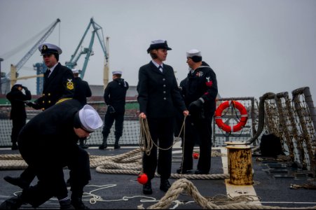U.S. Sailors aboard the guided missile destroyer USS Truxtun (DDG 103) prepare to pull into Constanța, Romania, March 8, 2014 140308-N-EI510-193