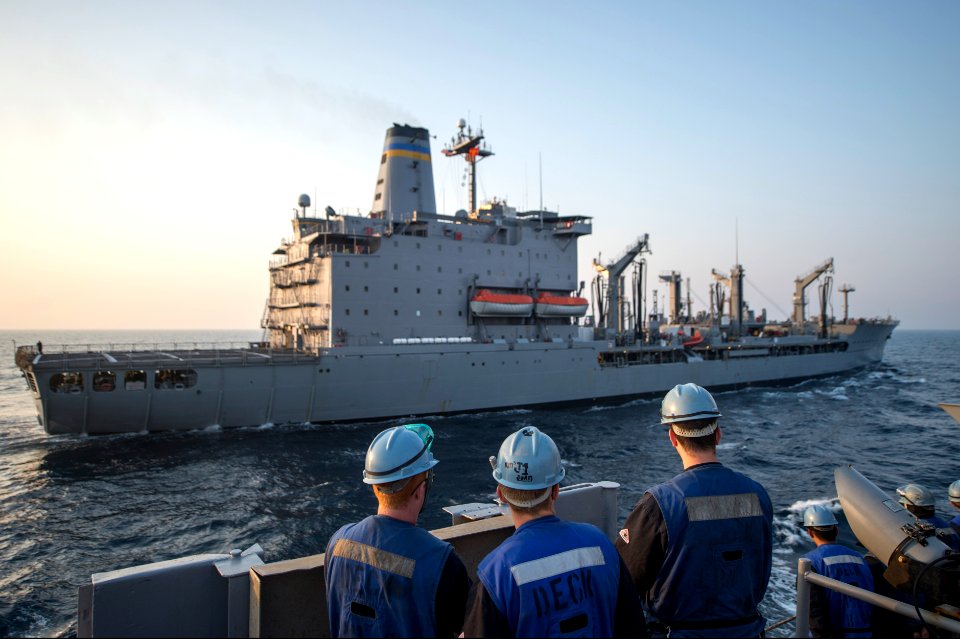 U.S. Sailors assigned to the amphibious transport dock ship USS Denver (LPD 9) stand by before conducting a replenishment at sea with the fleet replenishment oiler USNS Rappahannock (T-AO 204) in the East China 140327-N-ZU025-006