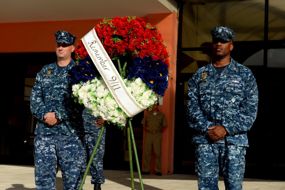 U.S. Navy petty officers first class selected to be chief petty officers participate in a 9-11 memorial ceremony Sept 140911-N-QY759-061