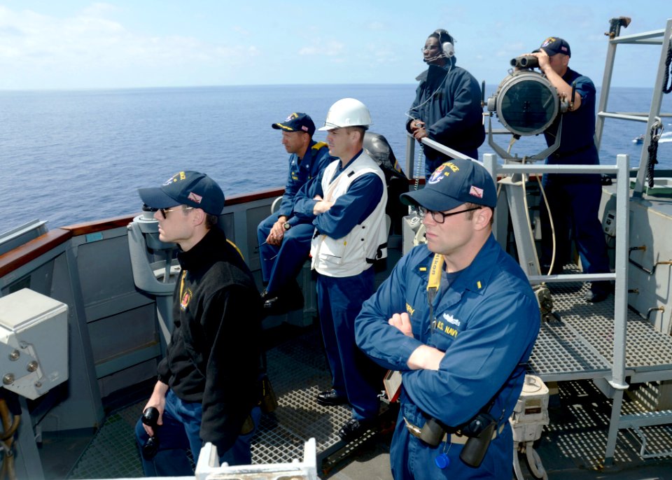 U.S. Sailors assigned to the guided missile destroyer USS Ramage (DDG 61), conduct bridge operations in the Mediterranean Sea April 9, 2014, in support of Noble Dina 2014 140409-N-CH661-628