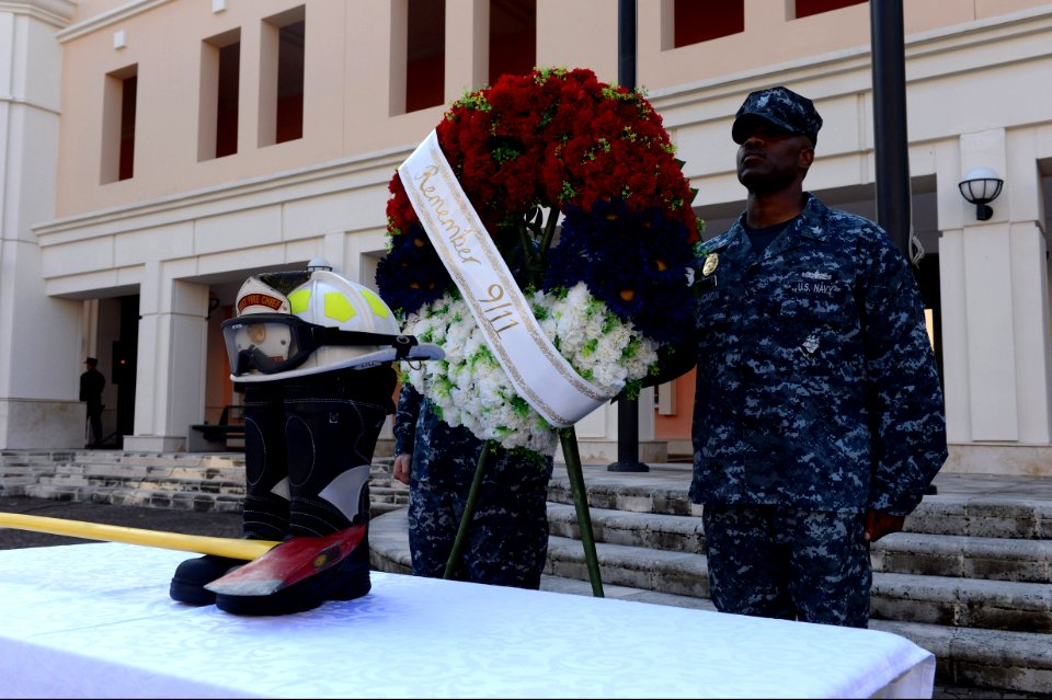 U.S. Navy petty officers first class selected to be chief petty officers lay a wreath as part of a 9-11 memorial ceremony Sept 140911-N-QY759-103