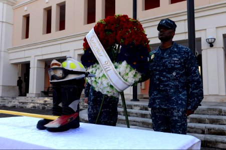 U.S. Navy petty officers first class selected to be chief petty officers lay a wreath as part of a 9-11 memorial ceremony Sept 140911-N-QY759-103