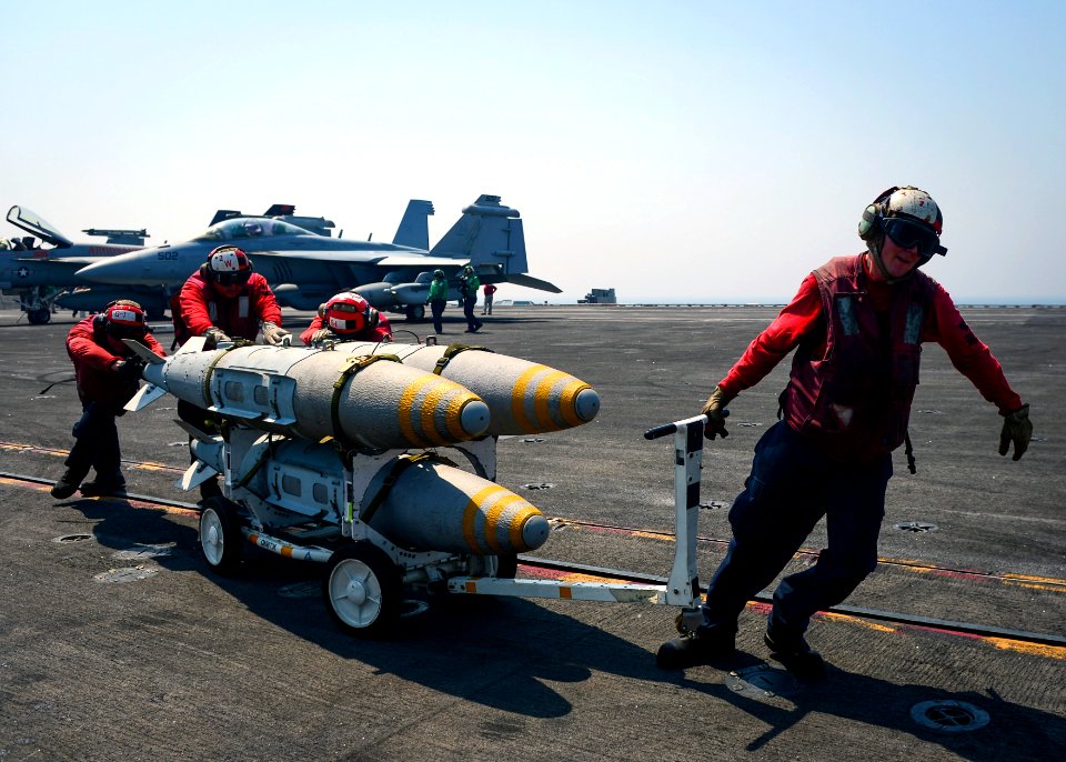 U.S. Navy Sailors move ordnance aboard USS Nimitz in the Arabian Gulf. (36009631052)