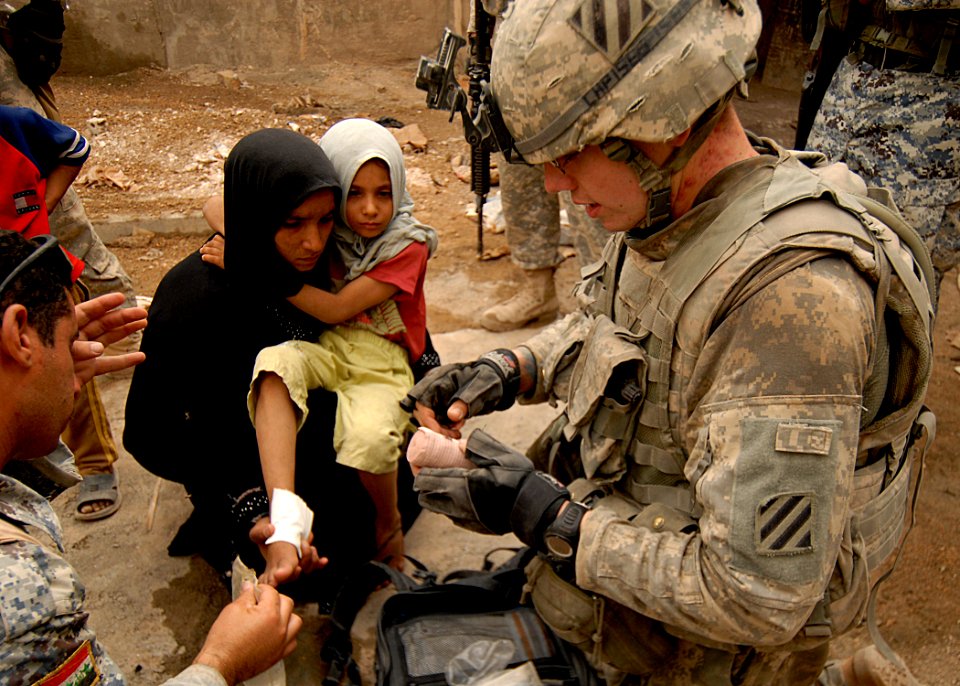 U.S. Soldiers pass out soccer balls DVIDS116285