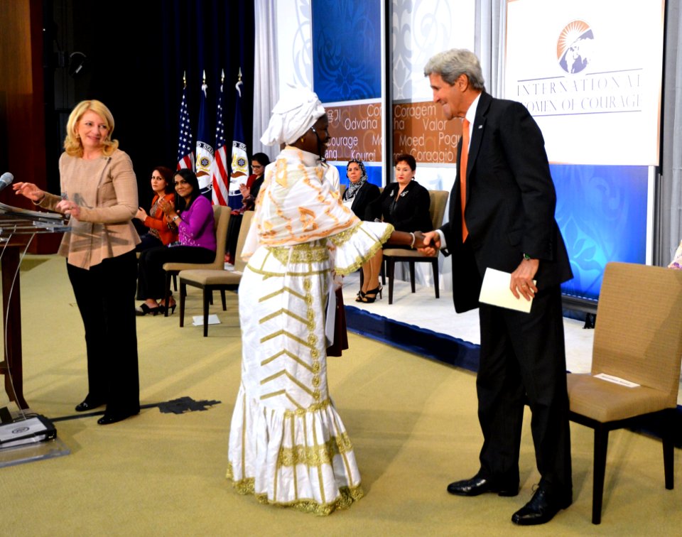 U.S. Secretary of State John Kerry and Fatimata M’baye of Mauritania after she delivers remarks at the Award Ceremony - IWOC 2016