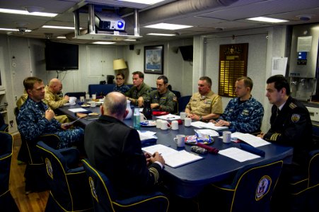 U.S., Bulgarian and Romanian navy officers hold a meeting aboard the guided missile destroyer USS Truxtun (DDG 103) in Varna, Bulgaria, March 15, 2014 140315-N-EI510-007