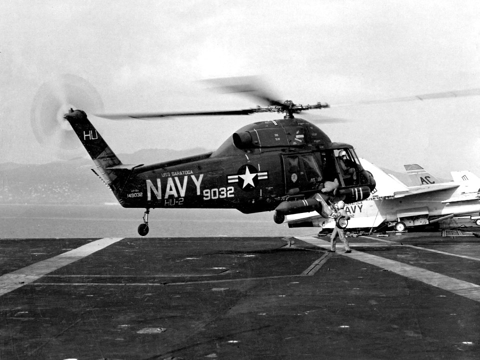 UH-2A of HU-2 hovers over USS Saratoga (CVA-60) in 1965