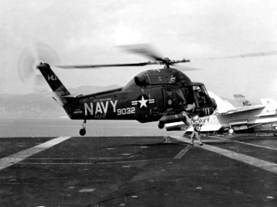 UH-2A of HU-2 hovers over USS Saratoga (CVA-60) in 1965