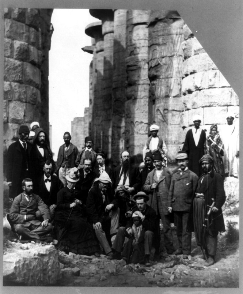 Ulysses S. Grant, full-length portrait, seated, facing right, with others at pyramids, Egypt LCCN97506901