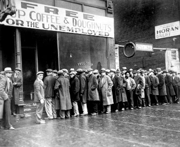 Unemployed men queued outside a depression soup kitchen opened in Chicago by Al Capone, 02-1931 - NARA - 541927 photo
