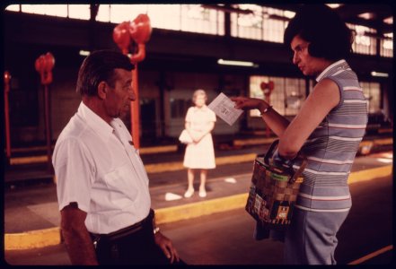 Unhappy Motorist, Right, Talks to a City Employee at an Auto Emission Inspection Station in Downtown Cincinnati, Ohio...09-1975 (4265794781)