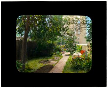 Unidentified city garden, probably in New York, New York. Pathway LCCN2008675965