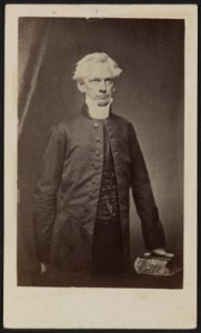 Unidentified man standing with hand on book) - From photographic negative from Brady's National Portrait Gallery LCCN2012646180