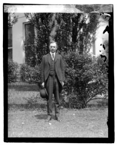 Unidentified man standing LOC npcc.04104