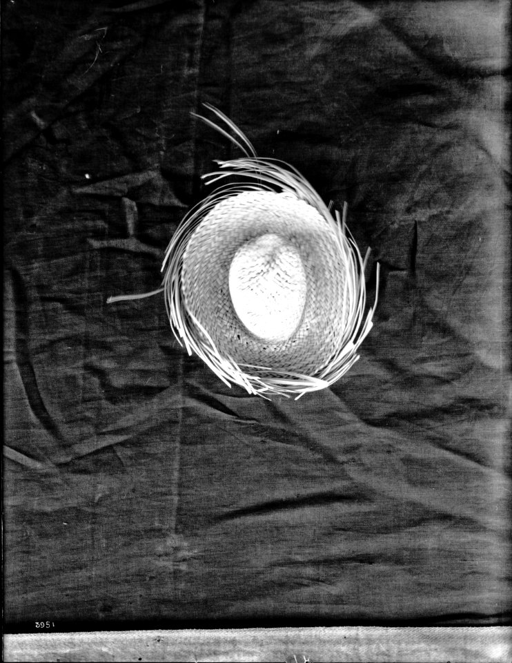 Unidentified hat-like Indian basket on display, ca.1900 (CHS-3951)