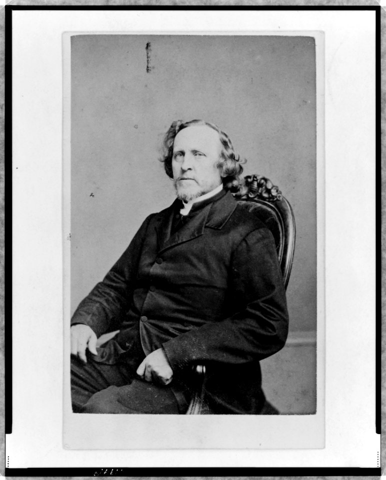 Unidentified man, three-quarter length portrait, seated, facing left LCCN98506701