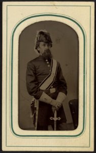 Unidentified man in Masonic regalia including gauntlets, belt, sash, and Knights Templar hat with sword) - C. C. Giers, Nashville LCCN2012646083