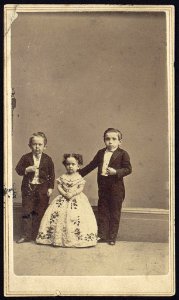 Unidentified little people, two males and a female, full-length studio portrait, standing, facing front LCCN2005677254