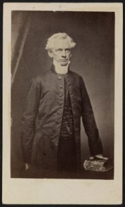 Unidentified man standing with hand on book) - From photographic negative from Brady's National Portrait Gallery LCCN2012646180 photo