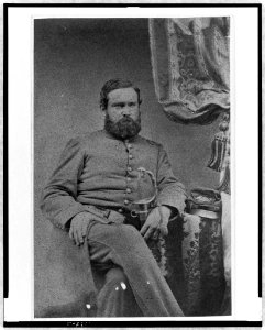 Unidentified officer, three-quarter length portrait, seated, with left hand on sword, facing right LCCN98506708