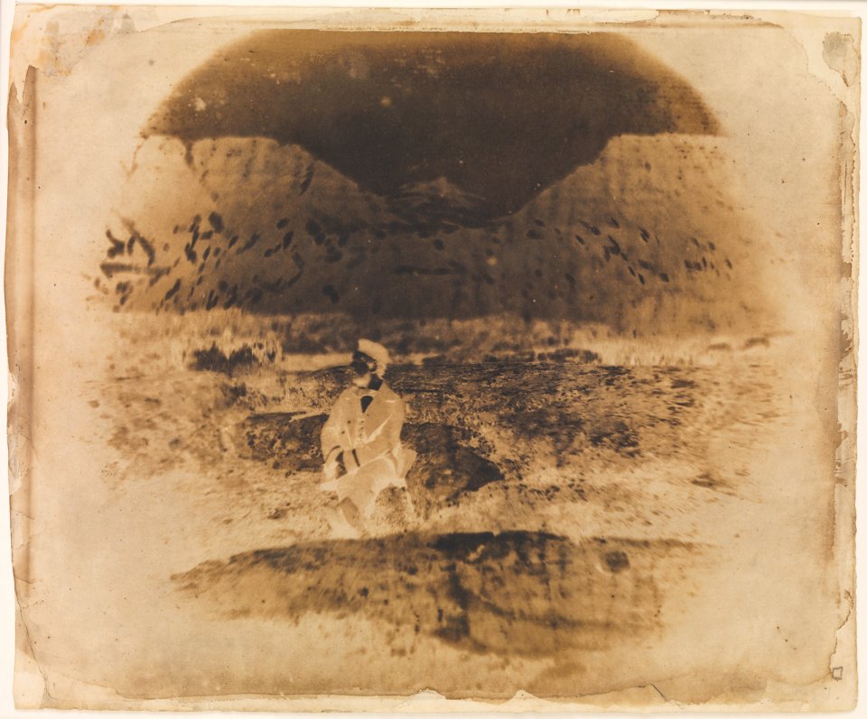 Unidentified naval lieutenant sitting on a rock RMG F6906-001