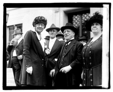 Unidentified people outside office building LOC npcc.05081