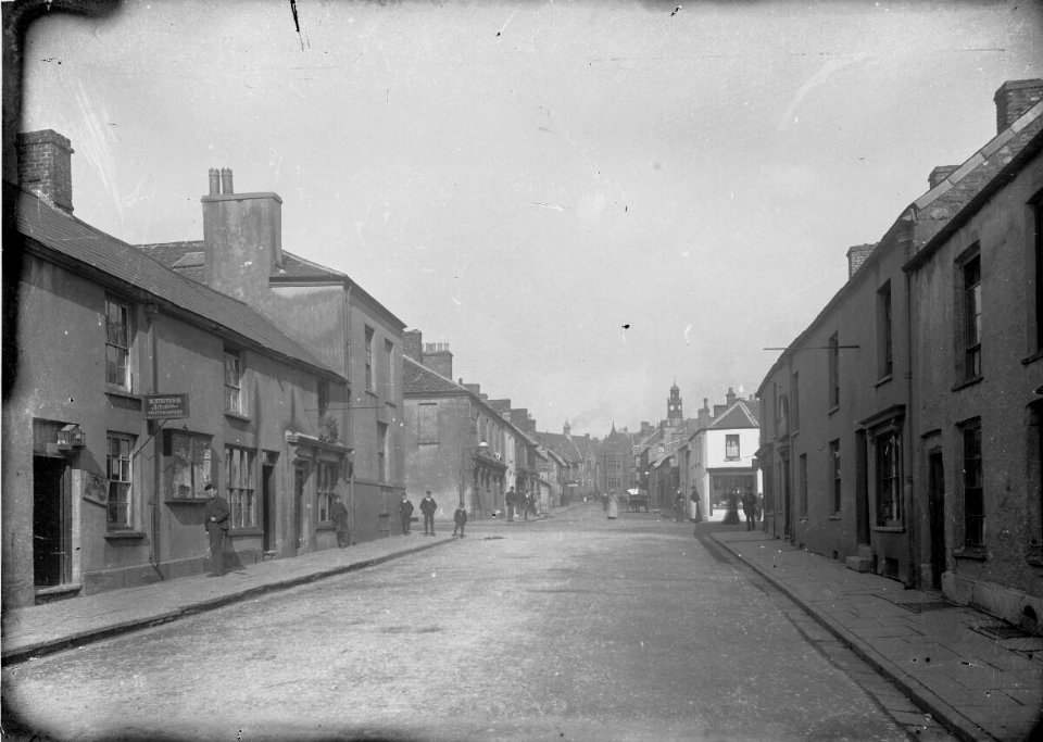 Unidentified street with premises of 'W Stafford, Artistic Photographer' (4785950)