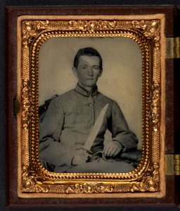 Unidentified soldier in Confederate artillery uniform with large Bowie knife LCCN2010650885 photo