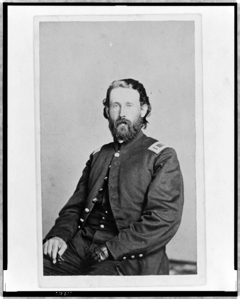 Unidentified Union officer, half-length portrait, seated, facing left, with left hand prostheses LCCN98506697