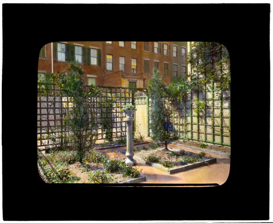 Unidentified townhouse garden, probably in New York, New York, or Philadelphia, Pennsylvania. Lattice fence LCCN2008675969