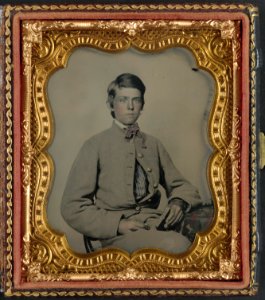 Unidentified young soldier in Confederate private's uniform with cased photograph LCCN2012646170