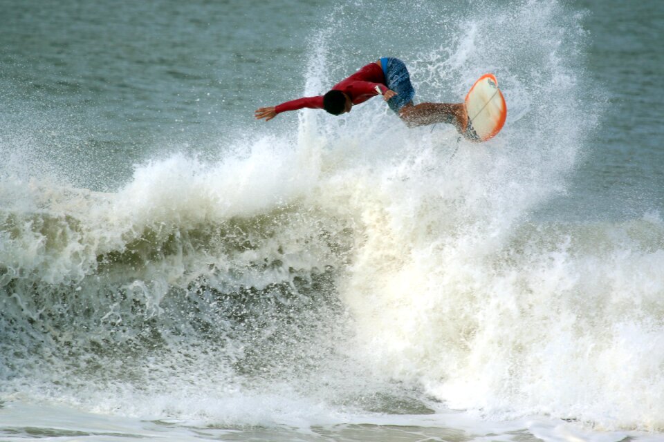 Surfer surfing board