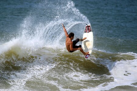 Surfer surfing board