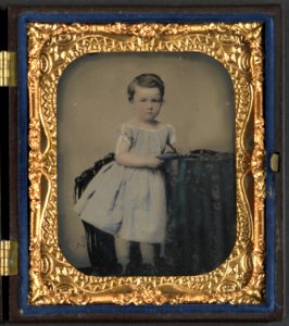 Unidentified young boy with cased photograph) - Rees LCCN2014646249