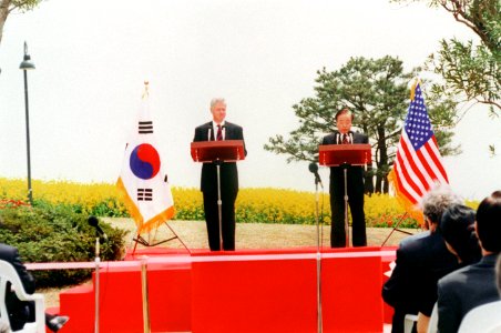 United States President Bill Clinton and Korean President Kim Yong Sam at podiums in Chejudo