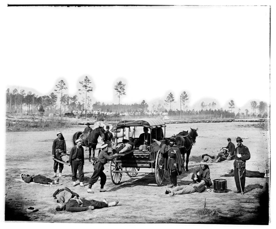 Unknown location. Zouave ambulance crew demonstrating removal of wounded soldiers from the field LOC cwpb.03950