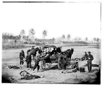 Unknown location. Zouave ambulance crew demonstrating removal of wounded soldiers from the field LOC cwpb.03950