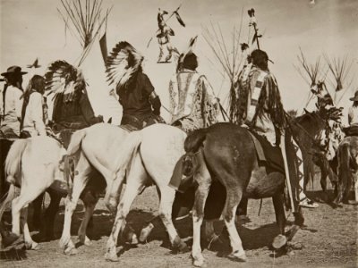 Untitled (Rear view of Native Americans riding)