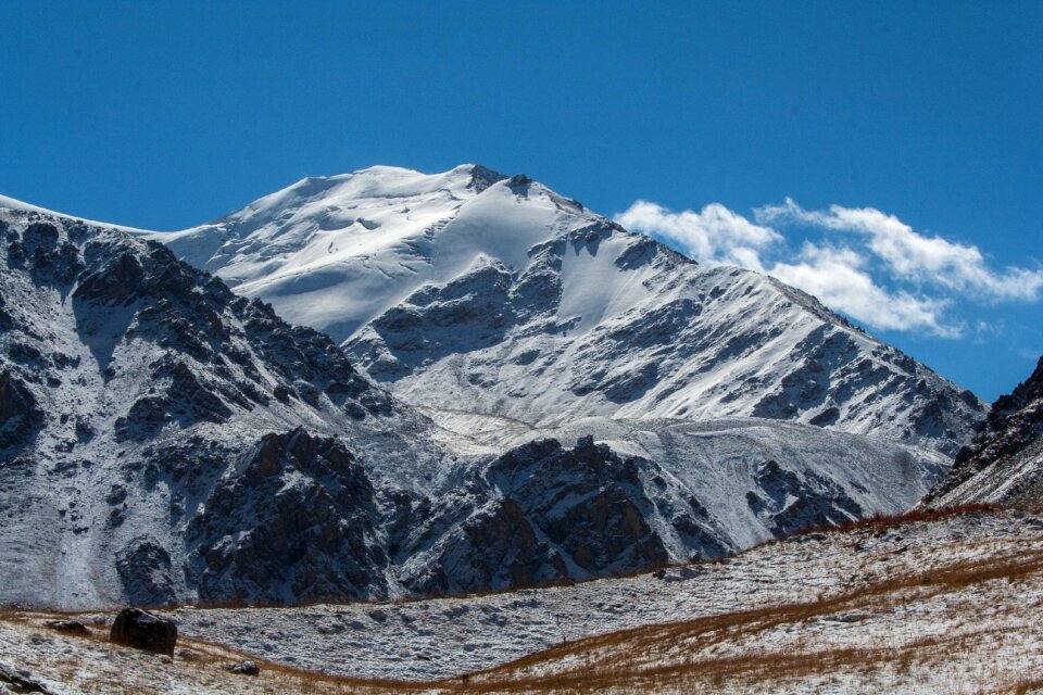 Mountains snow clouds photo