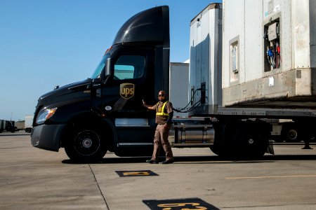 UPS semi trailer truck and driver in Arlington Texas