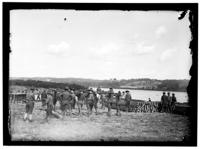 US Army Engineering unit building a pontoon bridge at Washington Barracks, Washington, D.C. LOC hec.10893