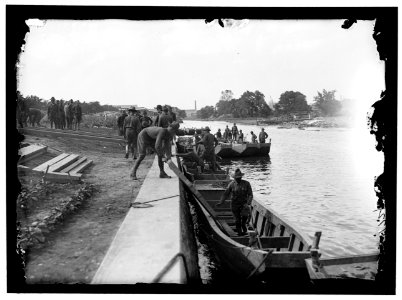 US Army Engineering unit building a pontoon bridge at Washington Barracks, Washington, D.C. LOC hec.10892