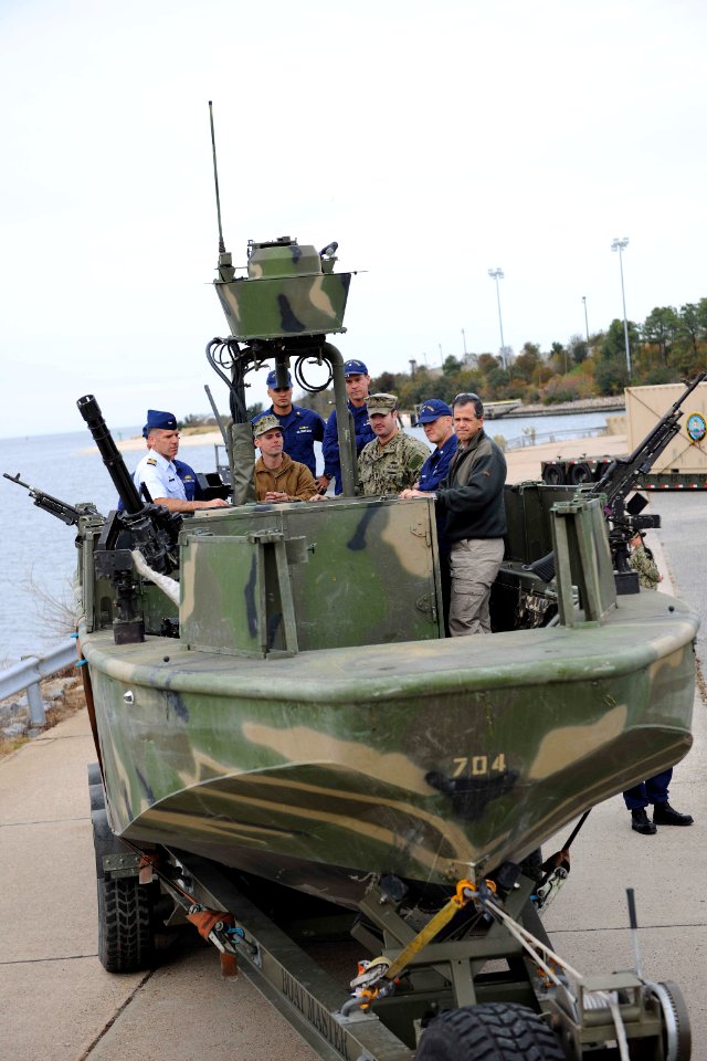 US Coast Guard liaison officers during a visit to Navy Expeditionary Combat Command 131115-N-MD211-030