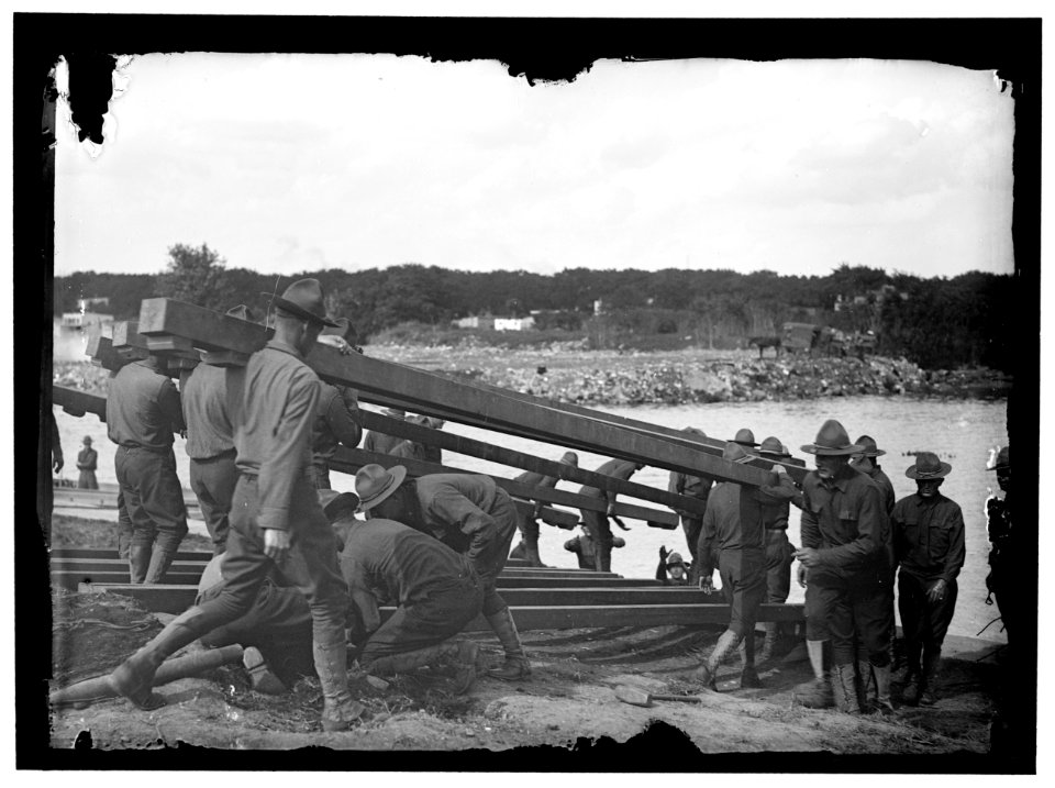 US Army Engineering unit building a pontoon bridge at Washington Barracks, Washington, D.C. LOC hec.10891