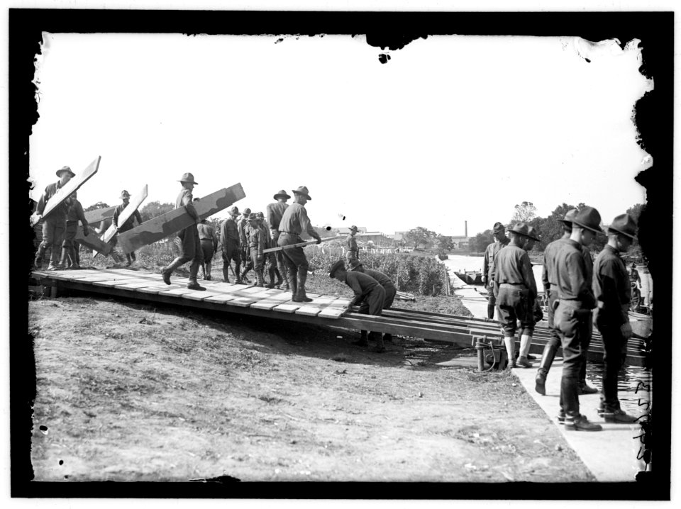 US Army Engineering unit building a pontoon bridge at Washington Barracks, Washington, D.C. LOC hec.10894