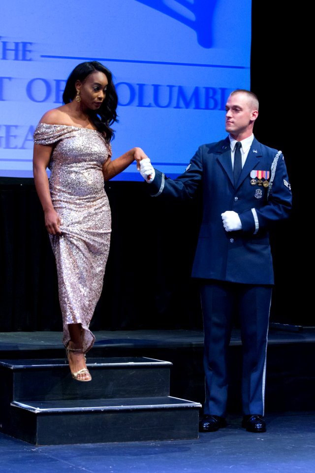 US Air Force Honor Guardsman assists in Miss District of Columbia 2015 Pageant 150614-N-WY366-011