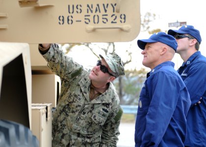 US Coast Guard liaison officers during a visit to Navy Expeditionary Combat Command 131115-N-MD211-094