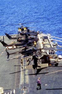 US Army helicopters on forward flight deck of USS Eisenhower (CVN-69) off Haiti in 1994